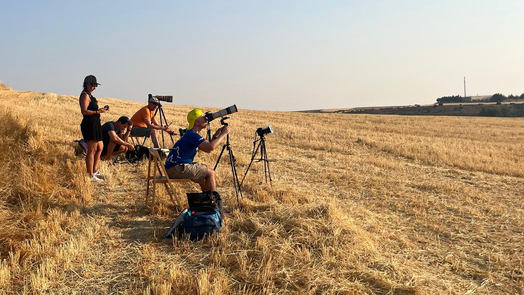 In the field shooting the eclipse with both cameras